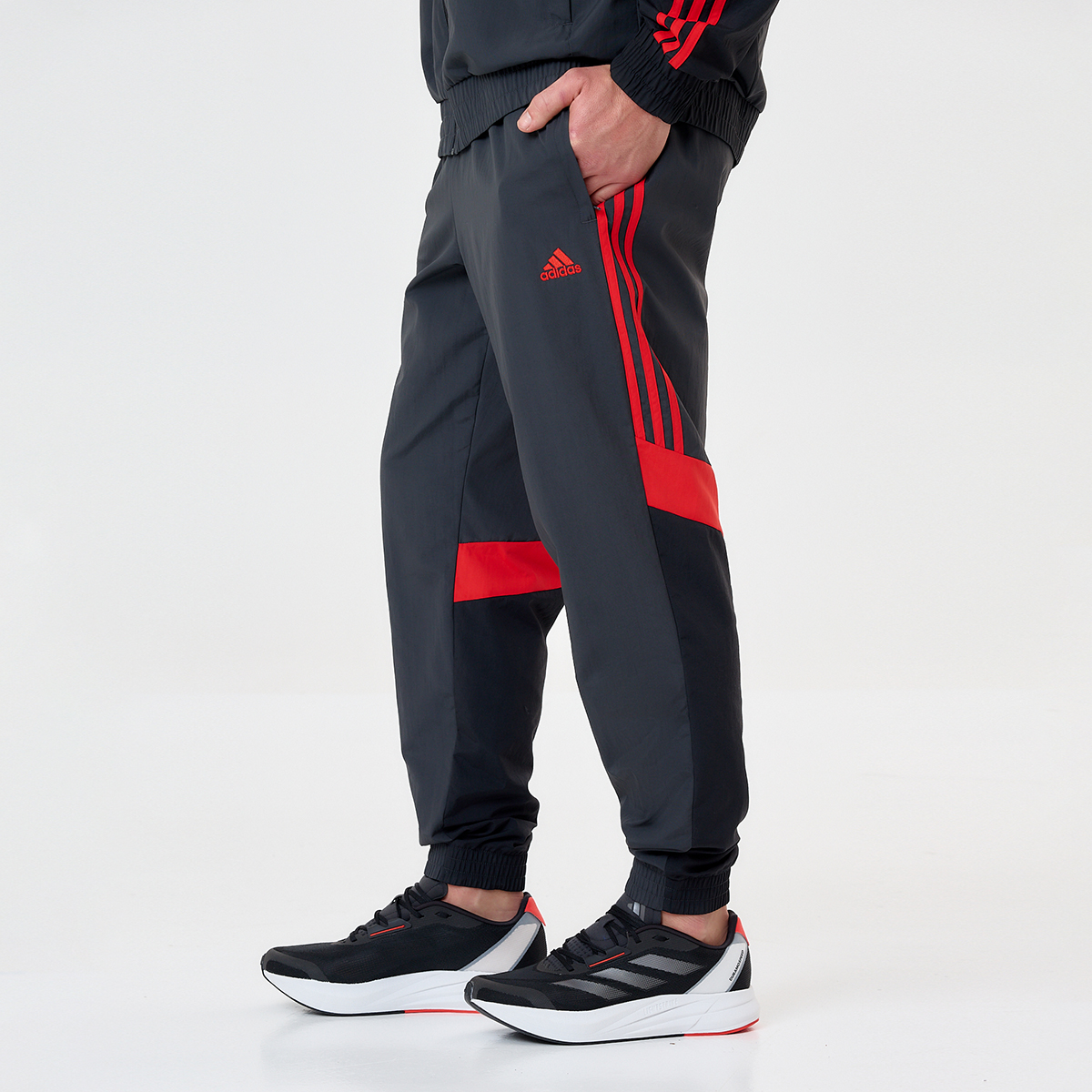 Pantalon adidas con cierre new arrivals